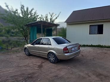 Mazda Familia: 2002 г., 1.6 л, Автомат, Бензин, Седан — 3