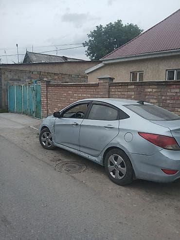 mini ev: Hyundai Solaris: 2011 г., Седан — 1