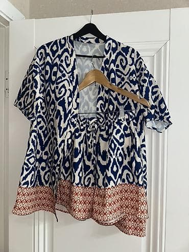 Комплект из летнего кимоно и шортов с этническим принтом.
Размер 42-44 — 3