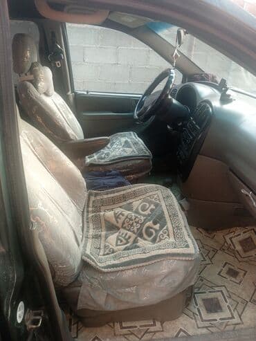 опель вектра б: Chrysler Grand Voyager: 2002 г., 2.4 л, Автомат, Бензиновая, Минивэн — 7