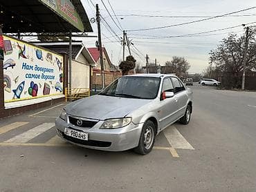 mg zr: Mazda 323: 2003 г., 1.6 л, Механика, Бензин, Седан — 1