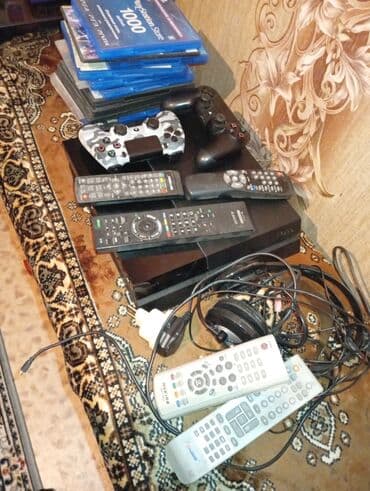 плейстейшен бу: Игровая консоль PlayStation 4 (черная, оригинальный корпус CUH-серии) — 1