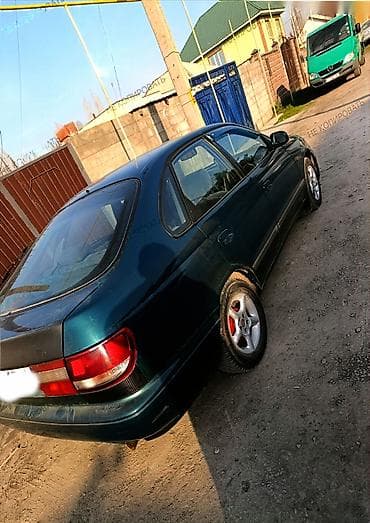 люк: Toyota Carina E: 1997 г., 1.6 л, Механика, Бензин, Хэтчбэк — 3