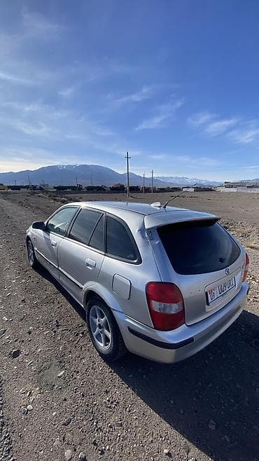 bnw x5: Mazda 323: 1998 г., 1.6 л, Механика, Бензин, Универсал — 4