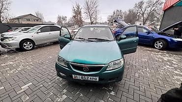 Mazda Familia: 2003 г., 1.6 л, Автомат, Бензин, Универсал at lalafo.kg Mazda Familia: 2003 г., 1.6 л, Автомат, Бензин, Универсал