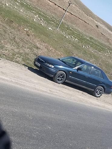 глушитель насадка: Mazda 626: 1998 г., 1.8 л, Механика, Бензин, Седан — 3