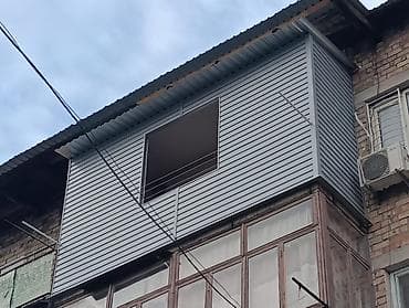 Облицовка и реконструкция балконов/лоджий под ключ - Обшивка фасада