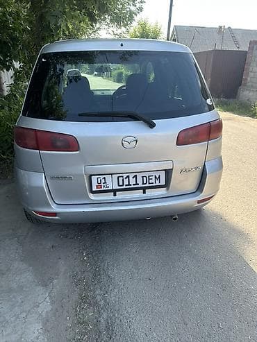 пл: Mazda Demio: 2004 г., 1.5 л, Автомат, Бензин, Универсал — 7