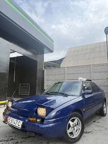 Mazda 323: 1991 г., 1.6 л, Механика, Бензин