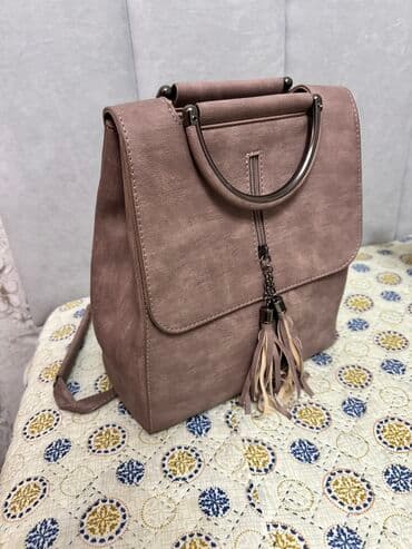 Сумка новая. Получается как сумка на плечо, и как рюкзак. Брали за