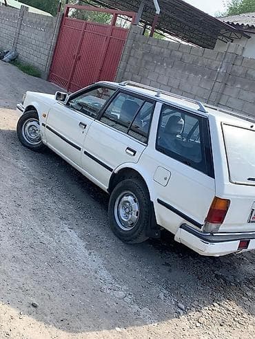 бмв 525 e34: Nissan Bluebird: 1990 г., Механика, Бензин, Универсал — 5