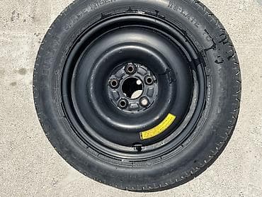Докатка (запасное колесо) Dunlop Space Miser на штампованном стальном