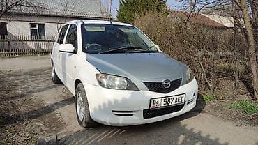 кресло водителя: Mazda Demio: 2003 г., 1.3 л, Автомат, Бензин — 1