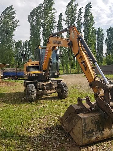 mini kooper: Экскаватор, Hyundai, Колесный — 1