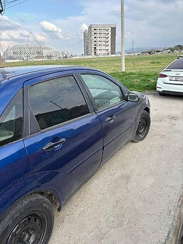 колпачки на колёса: Ford Focus: 2002 г., 2 л, Автомат, Бензин, Седан — 6