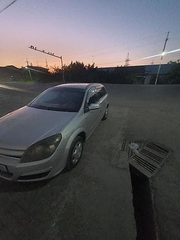 gac aion s 2021: Opel Astra: 2005 г., Механика, Универсал — 4