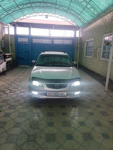 полик для машины: Mazda Capella: 2002 г., 2 л, Механика, Бензин, Хэтчбэк — 6