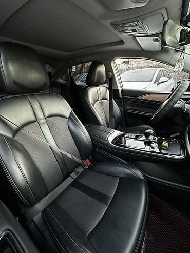 GAC: GAC Aion s белого цвета Кузов и внешность: - Динамичный дизайн — 6