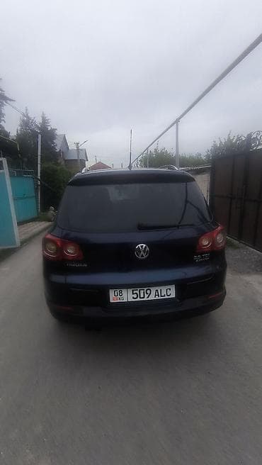 катафоты: Volkswagen Tiguan: 2011 г., 2 л, Автомат, Бензин, Кроссовер — 9