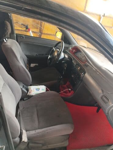 шины на рав 4: Mazda Cronos: 1996 г., 2 л, Механика, Бензин, Седан — 4