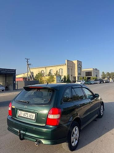 2 4 д: Mazda 323: 2000 г., 2 л, Механика, Бензин, Хэтчбэк — 5