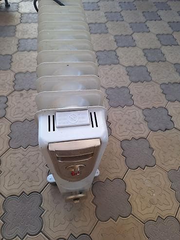 Масляный обогреватель Кол-во секций: 10 и более, Несколько режимов мощности