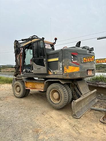 kia bango: Экскаватор, Volvo, Колесный — 4