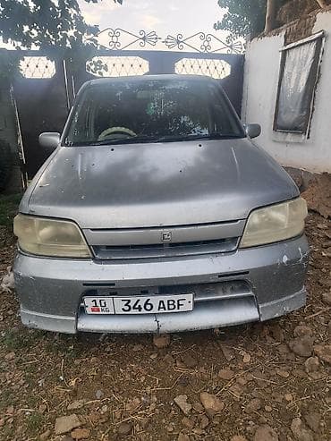 Nissan Cube: 2002 г., 1.3 л, Кол менен иштөөчү, Бензин, Хетчбек — 5