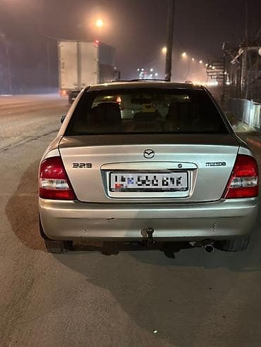 подшивочная машина: Mazda 323: 2002 г., 1.6 л, Ручные, Бензин, Седан — 3