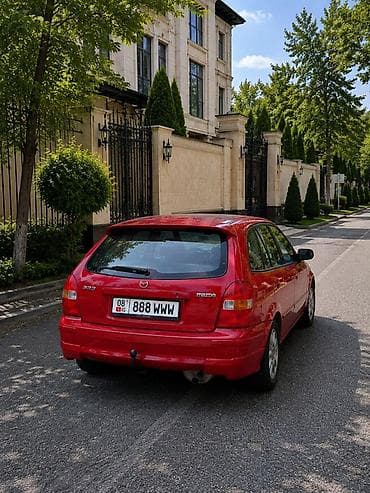 авто мотор: Mazda 323: 1998 г., Хэтчбэк — 2