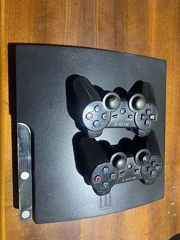 xbox one fat: Игровая консоль Sony PlayStation 3 (Slim) с двумя беспроводными — 1