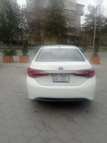 рассрочка авто лизинг: Toyota Corolla: 2019 г., 1.8 л, Робот, Гибрид, Седан — 5