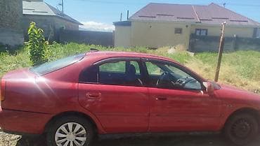 бартовой машина: Mitsubishi Carisma: 1998 г., Седан — 2