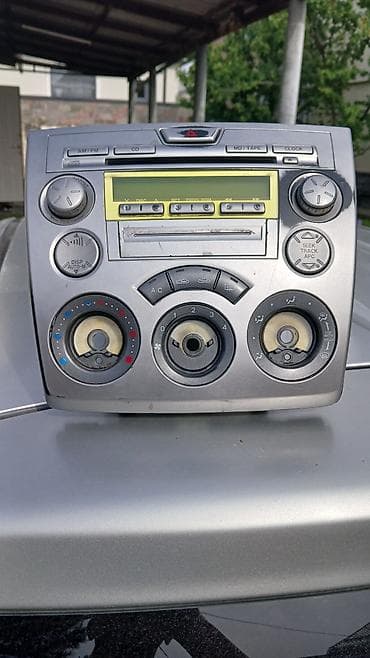 digital music changer: Блок климат контроля Mazda — 1