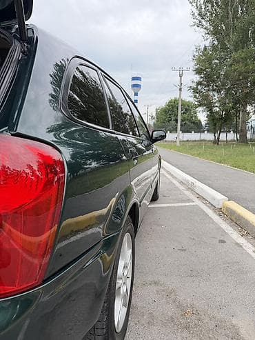 mistra: Mazda 323: 2003 г., 1.6 л, Автомат, Бензин, Универсал — 6