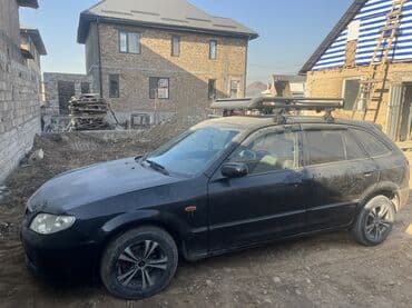 срочно продаю в связи с переездом: Mazda Familia: 2001 г., 1.6 л, Механика, Бензин, Универсал — 10
