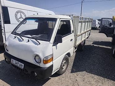Транспорт: Компактный бортовой грузовик Hyundai Porter с однорядной кабиной — 2