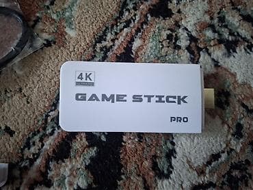 детские приставки nintendo switch: Игровая приставка Game Stick Pro (4K) с двумя беспроводными геймпадами — 5