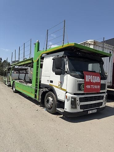 танк 400: Тягач, Volvo, 2007 г., Сar carrier trailer — 1