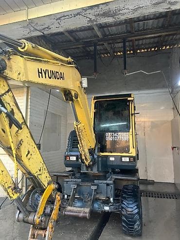 hyundai таракан: Экскаватор, Hyundai, 2011 г., Колесный — 3