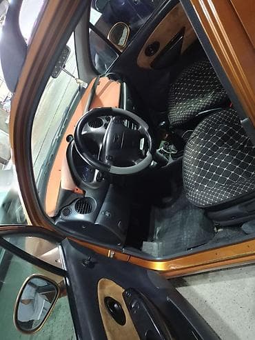 Унаа сатуу: Daewoo Matiz: 2003 г., 0.1 - engine capacity л, Кол менен иштөөчү, Бензин, Хетчбек — 3