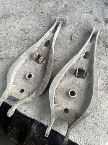 Задний левый рычаг BMW