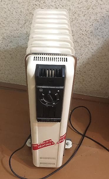 обогреватели масляные: Масляный обогреватель Кол-во секций: 7, Отключение при перегреве — 2