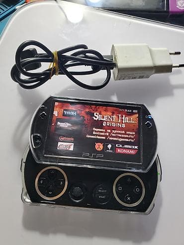 обменяю на: Очень редкая на сегодняшний день Psp Go прошитая 16 гб родная память — 1