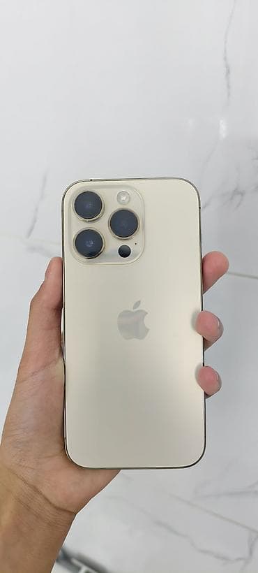 IPhone 14 Pro, Б/у, 256 ГБ, Золотой, Чехол, 84 % at lalafo.kg IPhone 14 Pro, Б/у, 256 ГБ, Золотой, Чехол, 84 %