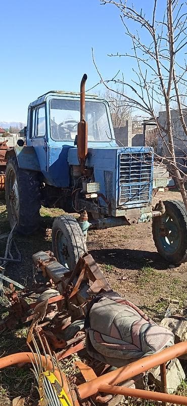 Тракторы LG: Трактор с прицепной сельхозтехникой Описание: - Колёсный трактор — 10