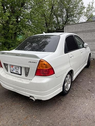 sprinter 2 7: Suzuki Aerio: 2004 г., 1.8 л, Автомат, Бензин — 7