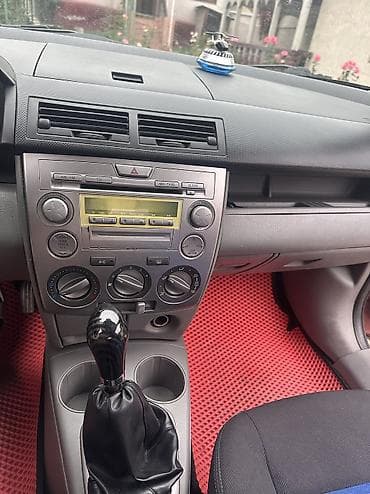 mazda 3: Mazda Demio: 2003 г., 1.4 л, Механика, Бензин, Хэтчбэк — 10