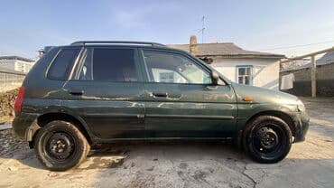 mazda: Mazda Demio: 2000 г., 1.5 л, Автомат, Бензин, Универсал — 4