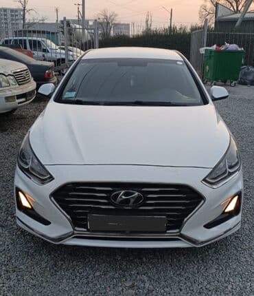 runx alex: Аренда авто (Такси) Белый седан Hyundai Sonata с динамичным дизайном — 1